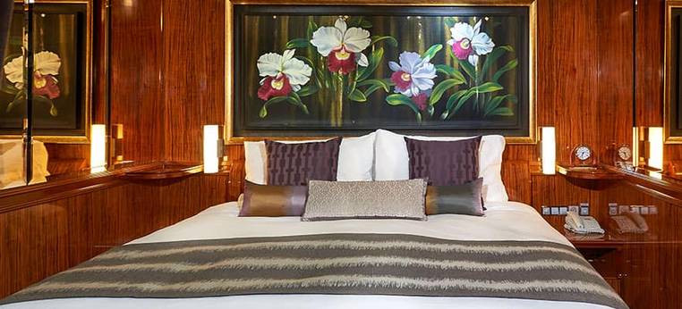 Norwegian Gem 2-Bedroom Deluxe Family Suite with Balcony (S4) bedroom, photo 2 of 2