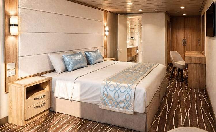 Regal Princess Reserve Mini-Suite No Balcony (MY) bedroom Regal Princess Reserve Mini-Suite No Balcony (MY) bedroom