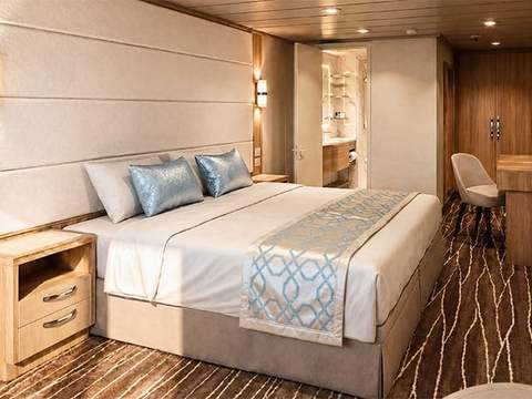 Regal Princess Reserve Mini-Suite No Balcony (MY) bedroom Regal Princess Reserve Mini-Suite No Balcony (MY) bedroom
