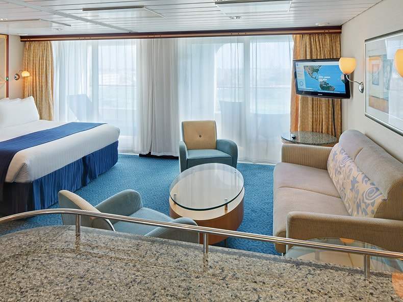 Adventure of the Seas Grand Suite - 1 Bedroom (GS) bedroom, photo 1 of 4