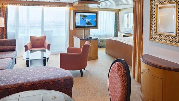 Adventure of the Seas Owner's Suite - 1 Bedroom (OS) living area, photo 1 of 4 Adventure of the Seas Owner's Suite - 1 Bedroom (OS) living area, photo 1 of 4