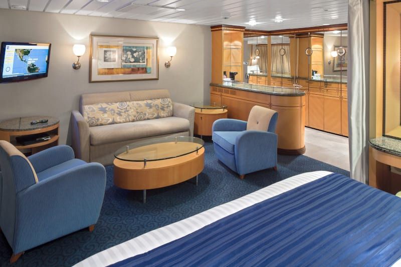 Adventure of the Seas Grand Suite - 1 Bedroom (GS) living area, photo 5 of 5
