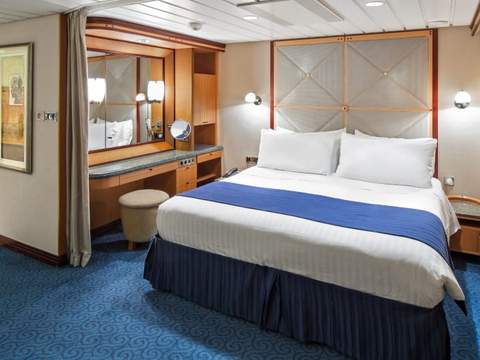 Adventure of the Seas Grand Suite - 1 Bedroom (GS) bedroom, photo 4 of 4