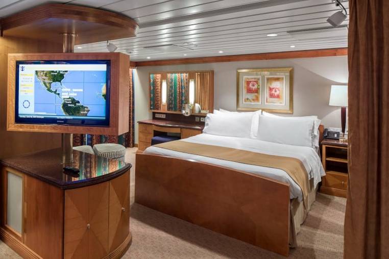 Adventure of the Seas Owner's Suite - 1 Bedroom (OS) bedroom