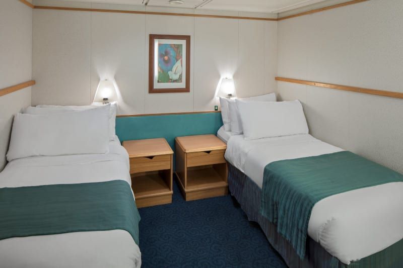 Adventure of the Seas Grand Suite - 2 Bedroom (GT) bedroom, photo 3 of 4