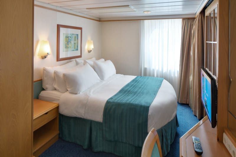 Adventure of the Seas Grand Suite - 2 Bedroom (GT) bedroom, photo 4 of 4