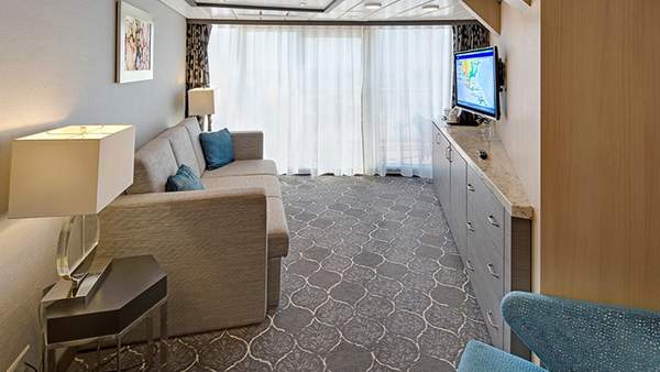 Allure of the Seas Spacious AquaTheater Suite - 1 Bedroom (A3) living area, photo 1 of 2