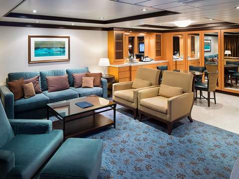 Allure of the Seas Owner's Suite - 1 Bedroom (OS) living area, photo 1 of 3