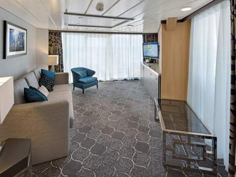 Allure of the Seas Spacious AquaTheater Suite - 1 Bedroom (A3) living area, photo 3 of 4