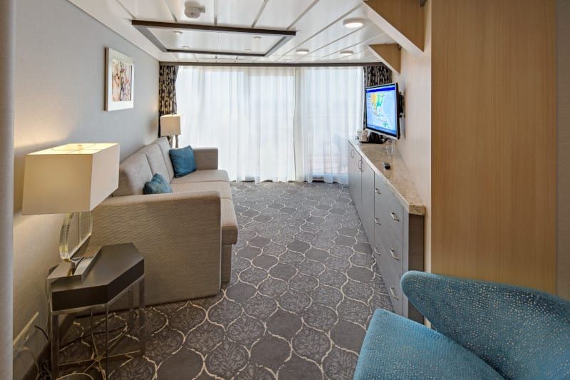 Allure of the Seas Spacious AquaTheater Suite - 1 Bedroom (A3) living area, photo 4 of 4