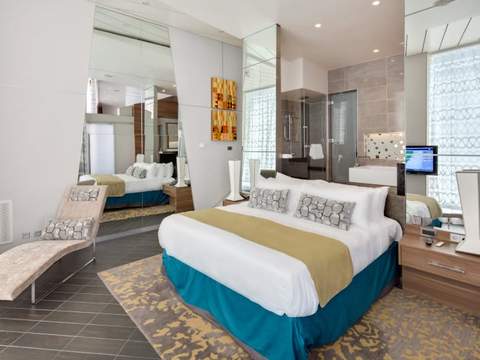 Allure of the Seas Owner's Panoramic Suite - 1 Bedroom (OP) bedroom