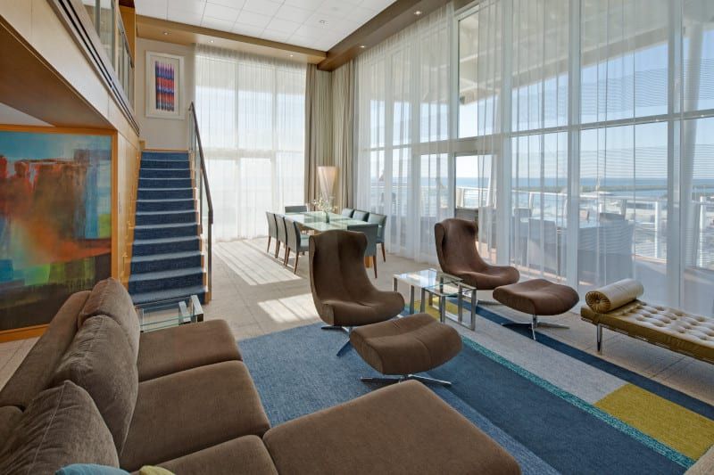 Allure of the Seas Royal Loft Suite (RL) living area, photo 8 of 9