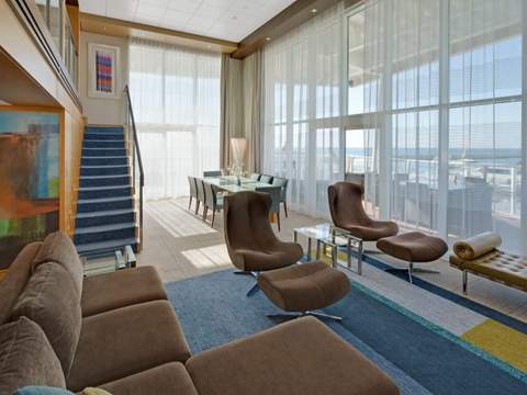 Allure of the Seas Royal Loft Suite (RL) living area, photo 8 of 9 Allure of the Seas Royal Loft Suite (RL) living area, photo 8 of 9