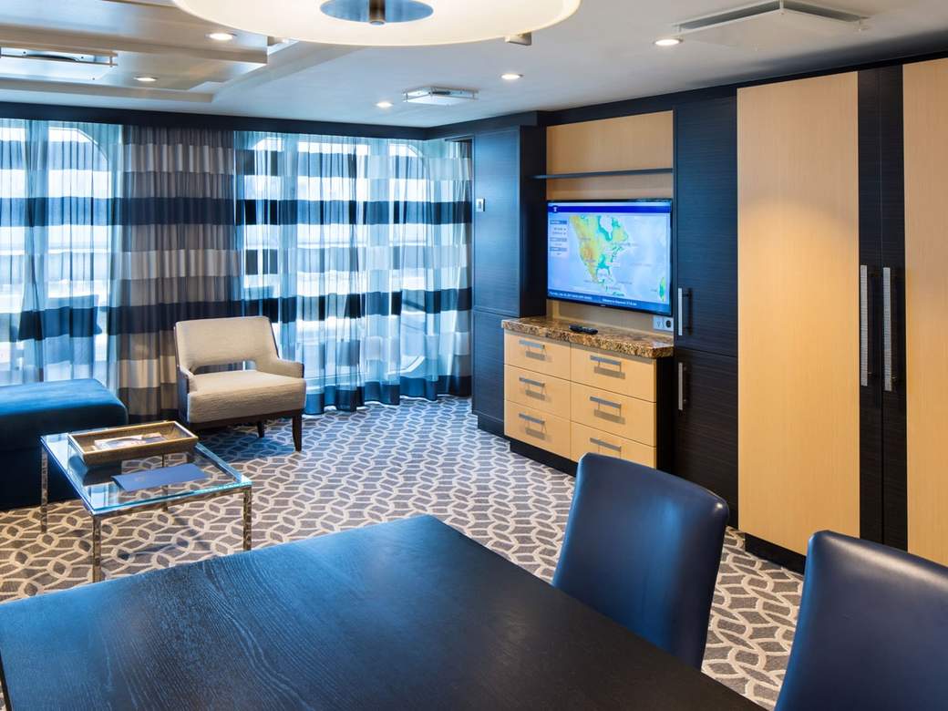 Anthem of the Seas Owner's Suite - 1 Bedroom (OS) living area, photo 1 of 5