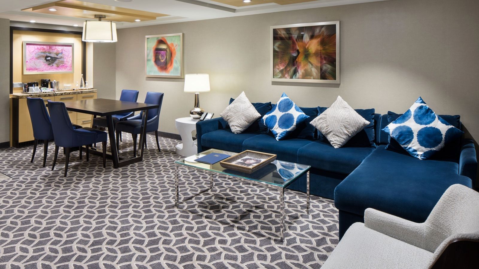 Anthem of the Seas Owner's Suite - 1 Bedroom (OS) living area, photo 2 of 5