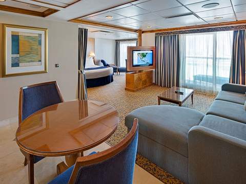 Brilliance of the Seas Owner's Suite - 1 Bedroom (OS) living area, photo 1 of 5