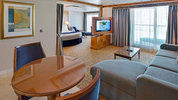 Brilliance of the Seas Owner's Suite - 1 Bedroom (OS) living area, photo 1 of 5 Brilliance of the Seas Owner's Suite - 1 Bedroom (OS) living area, photo 1 of 5