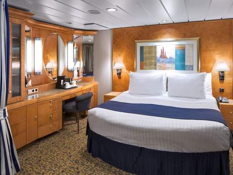 Brilliance of the Seas Owner's Suite - 1 Bedroom (OS) bedroom