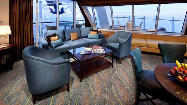Symphony of the Seas Spacious AquaTheater Suite Large Balcony - 2 Bedroom (A1) living area