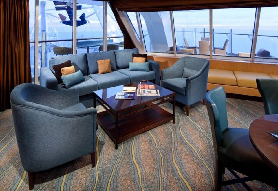 Symphony of the Seas Spacious AquaTheater Suite Large Balcony - 2 Bedroom (A1) living area