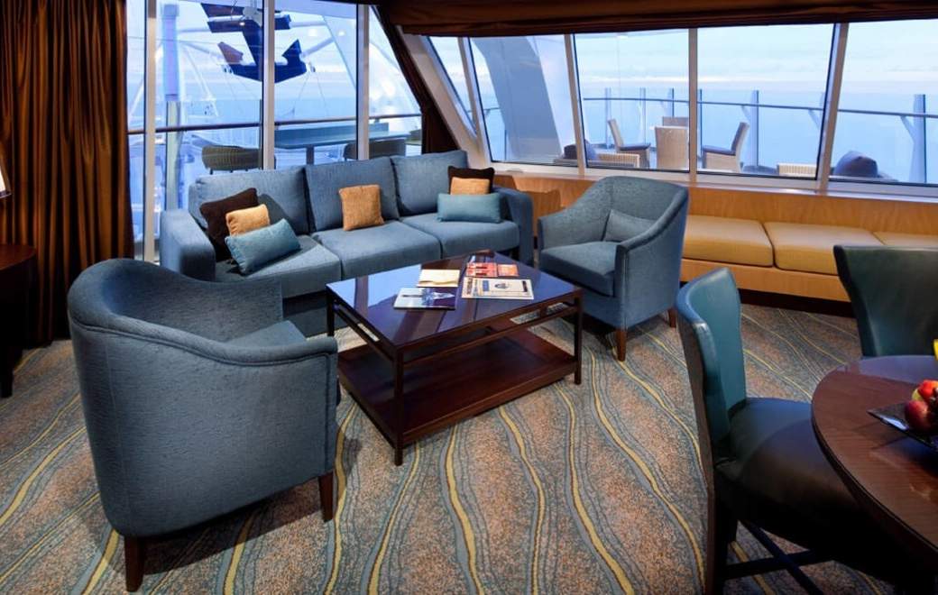 Symphony of the Seas Spacious AquaTheater Suite Large Balcony - 2 Bedroom (A1) living area