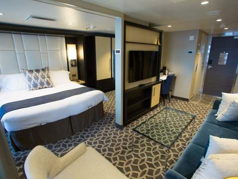 Rhapsody of the Seas Grand Suite - 1 Bedroom (GS) bedroom, photo 2 of 2