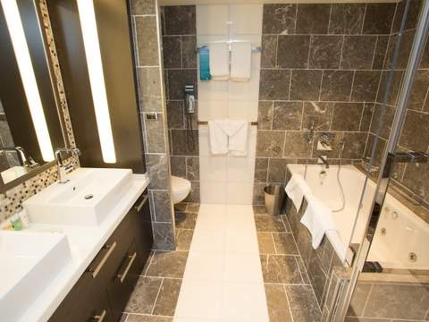 Rhapsody of the Seas Owner's Suite - 1 Bedroom (OS) bathroom, photo 2 of 2