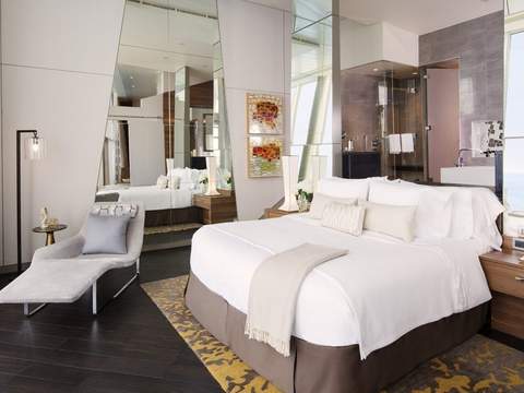 Rhapsody of the Seas Royal Suite - 1 Bedroom (RS) bedroom, photo 1 of 2