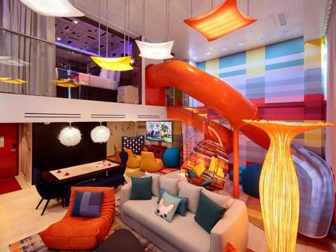 Symphony of the Seas Ultimate Family Suite (US) living area, photo 2 of 7