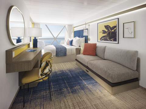 Freedom of the Seas Ocean View Panoramic Suite (No Balcony) (VP) living area