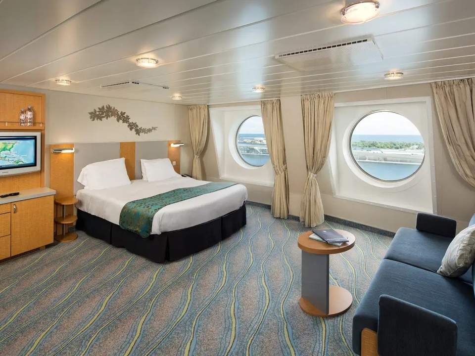 Jewel of the Seas Ocean View Suite - 2 Bedroom (No Balcony) (VT) bedroom, photo 1 of 3
