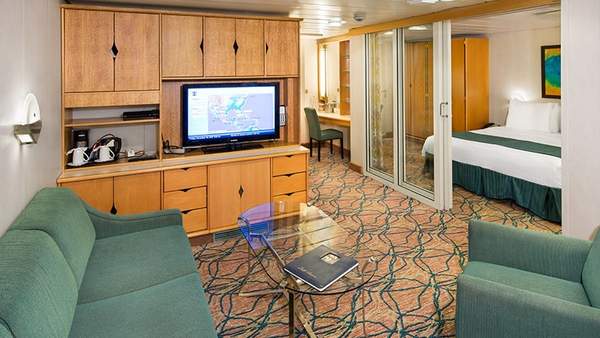Enchantment of the Seas Grand Suite - 2 Bedroom (GT) living area, photo 1 of 2 Enchantment of the Seas Grand Suite - 2 Bedroom (GT) living area, photo 1 of 2