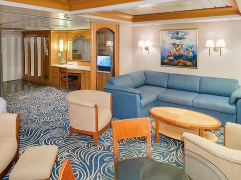 Enchantment of the Seas Owner's Suite - 1 Bedroom (OS) living area, photo 1 of 3 Enchantment of the Seas Owner's Suite - 1 Bedroom (OS) living area, photo 1 of 3