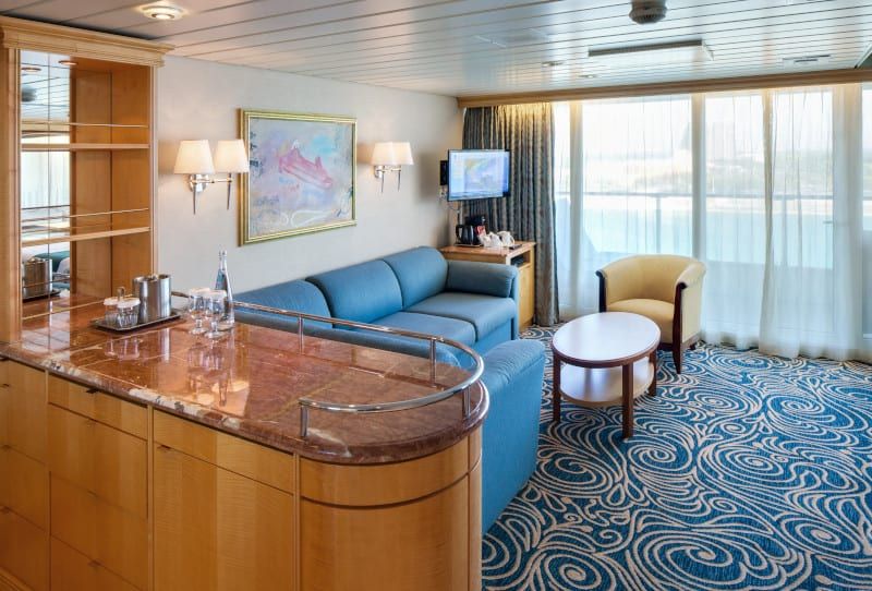 Enchantment of the Seas Grand Suite - 1 Bedroom (GS) living area, photo 6 of 6
