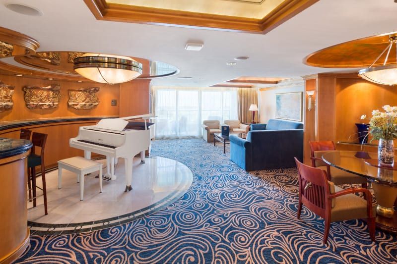 Enchantment of the Seas Royal Suite - 1 Bedroom (RS) living area, photo 2 of 2