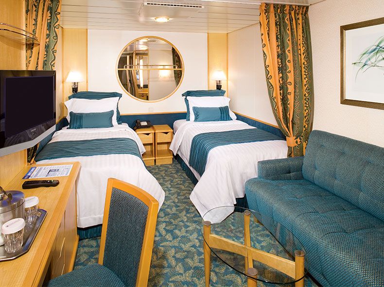 This standard stateroom offers two twin beds, a private bath and all the amenities of our standard staterooms.