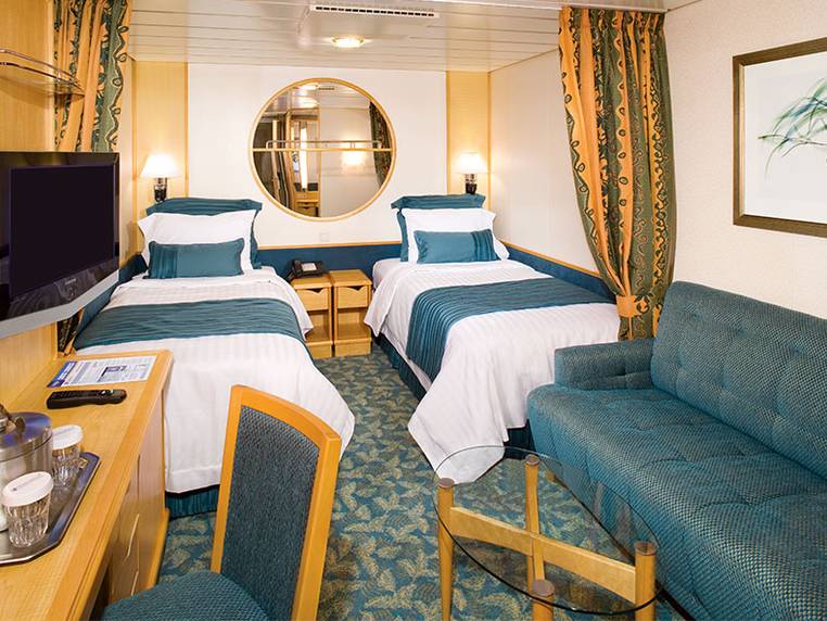 This standard stateroom offers two twin beds, a private bath and all the amenities of our standard staterooms.