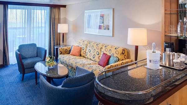 Freedom of the Seas Grand Suite - 1 Bedroom (GS) living area, photo 1 of 5