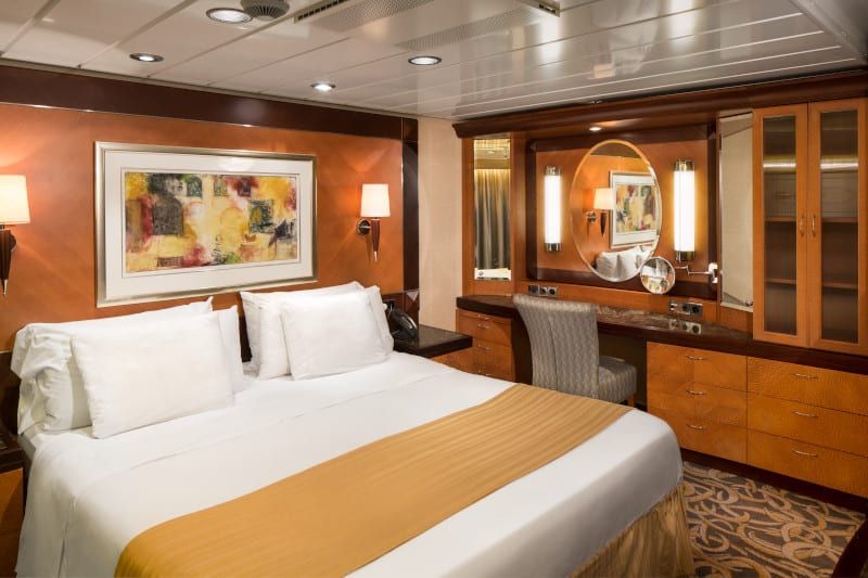 Freedom of the Seas Owner's Suite - 1 Bedroom (OS) bedroom