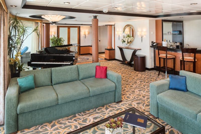 Freedom of the Seas Royal Suite - 1 Bedroom (RS) living area, photo 2 of 2