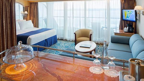 Grandeur of the Seas Grand Suite - 1 Bedroom (GS) living area, photo 1 of 5 Grandeur of the Seas Grand Suite - 1 Bedroom (GS) living area, photo 1 of 5