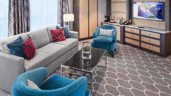Harmony of the Seas Spacious AquaTheater Suite Large Balcony - 2 Bedroom (A1) living area, photo 1 of 2