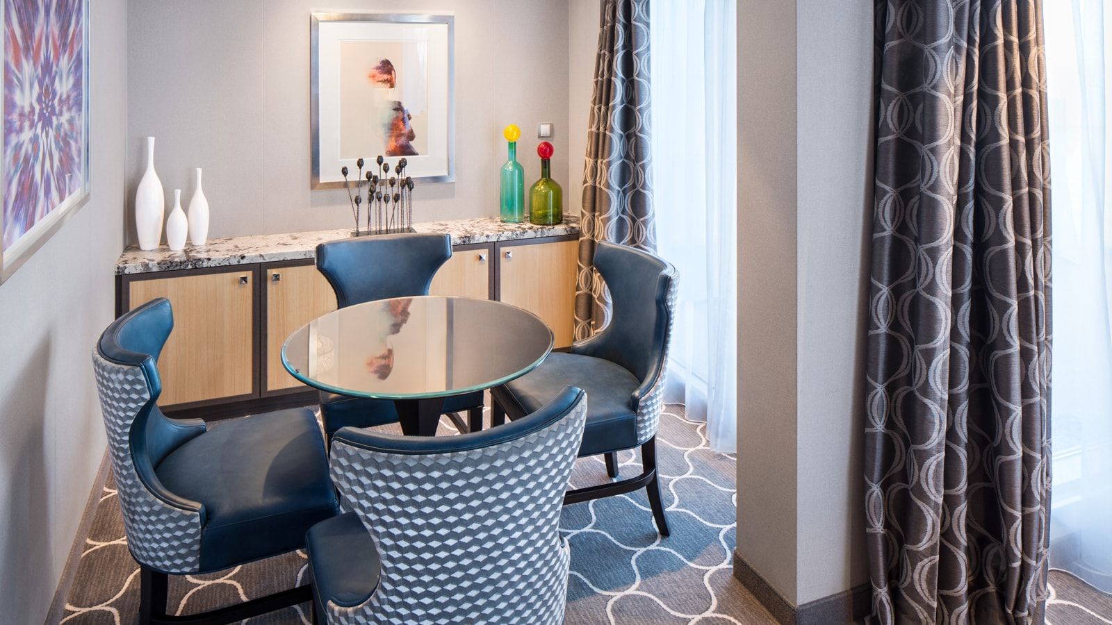 Harmony of the Seas Spacious AquaTheater Suite Large Balcony - 2 Bedroom (A1) dining area