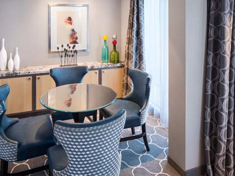 Harmony of the Seas Spacious AquaTheater Suite Large Balcony - 2 Bedroom (A1) dining area