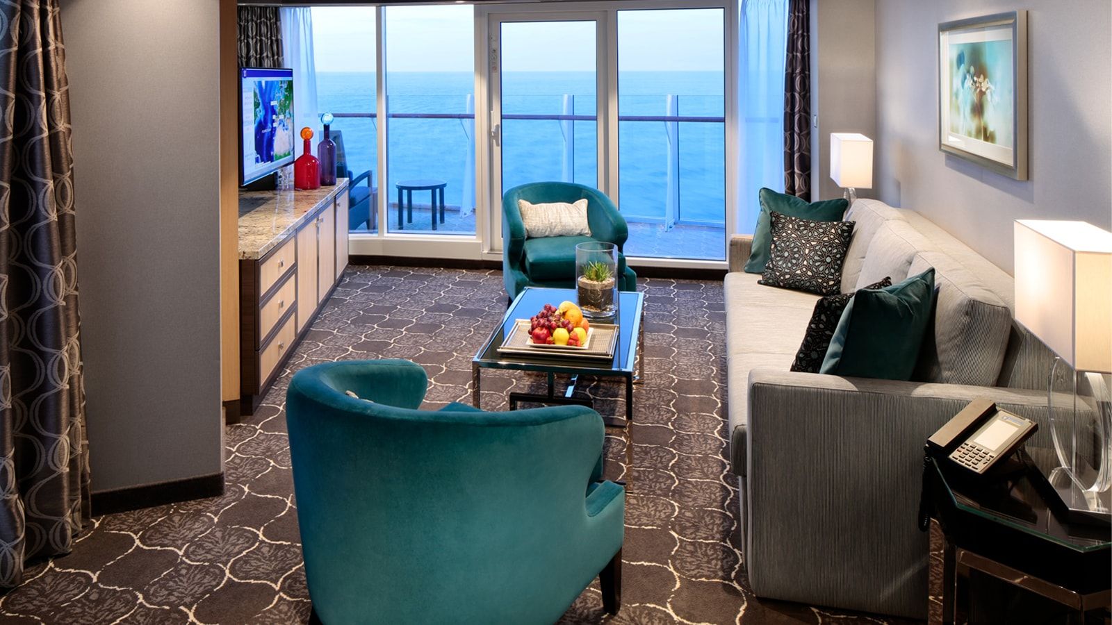 Harmony of the Seas Spacious AquaTheater Suite - 1 Bedroom (A3) living area, photo 1 of 3
