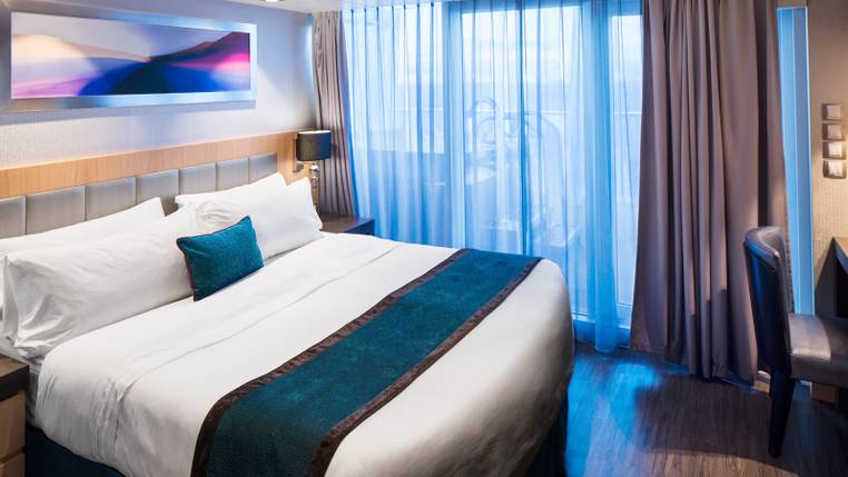Harmony of the Seas Royal Loft Suite (RL) bedroom, photo 2 of 3