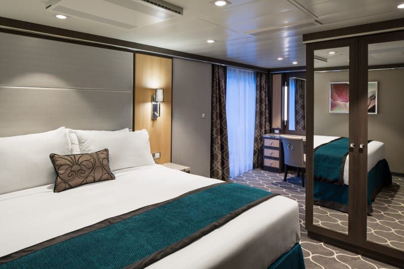 Harmony of the Seas Spacious AquaTheater Suite Large Balcony - 2 Bedroom (A1) bedroom, photo 2 of 3