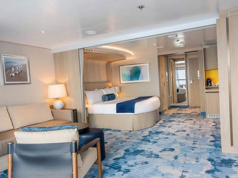 Legend of the Seas Infinite Grand Suite (IG) bedroom, photo 3 of 4