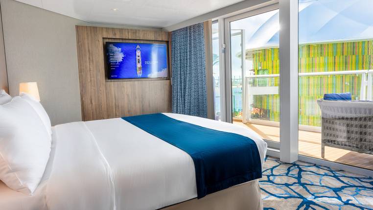 Legend of the Seas Royal Loft Suite (RL) bedroom, photo 3 of 4