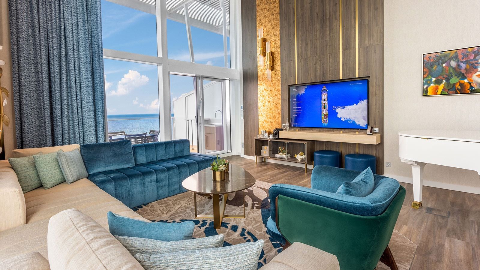 Legend of the Seas Royal Loft Suite (RL) living area, photo 1 of 9